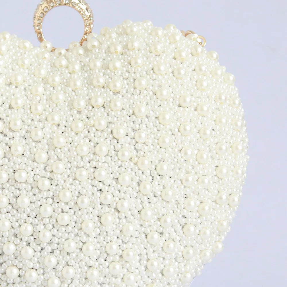 Ulfat All White Pearl Hand Embroidered Heart Clutch
