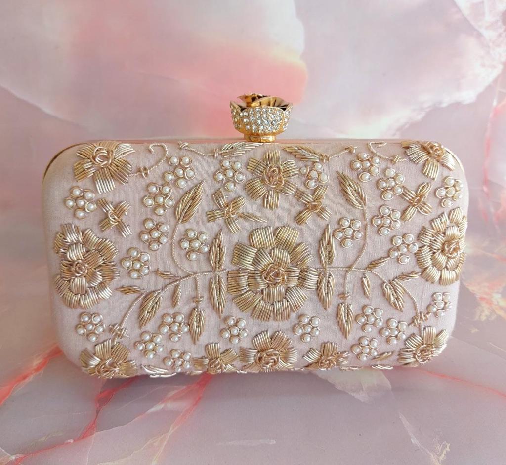 white golden embroidered clutch